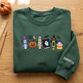 Personalized Halloween Teacher School Supplies Witch Pumpkin Mummy Ghost Crayon Candy Corn embroidered sweatshirt — front view