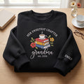 Personalized Her Sweetest Chapter Grandma Books Coffee Floral EST Year embroidered sweatshirt — front view