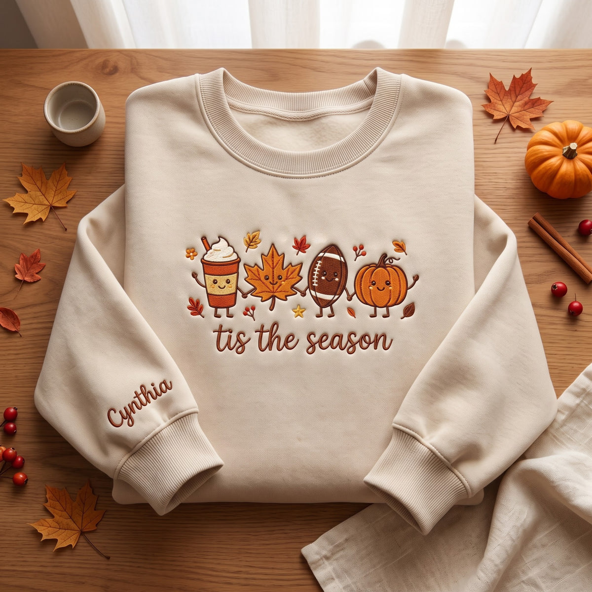 Personalized Tis the Season Fall Pumpkin Spice Latte Maple Leaf Football Kawaii embroidered sweatshirt — front view