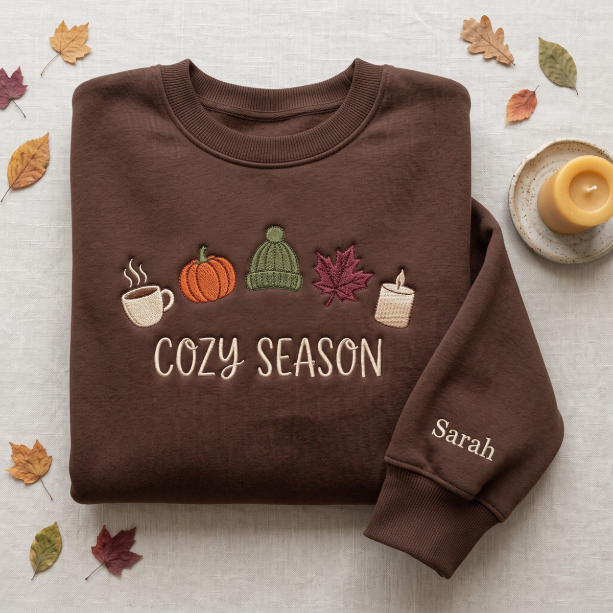 Personalized Cozy Season Fall Coffee Pumpkin Beanie Maple Leaf Candle embroidered sweatshirt — front view