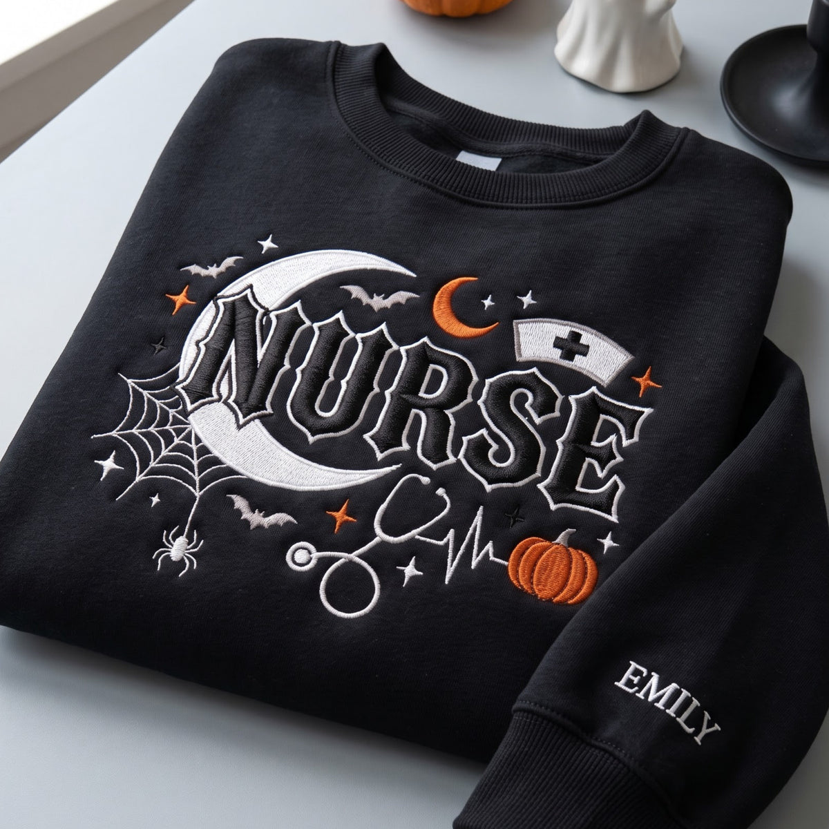 Personalized Halloween Nurse Crescent Moon Spider Web Stethoscope Pumpkin Bats embroidered sweatshirt — front view