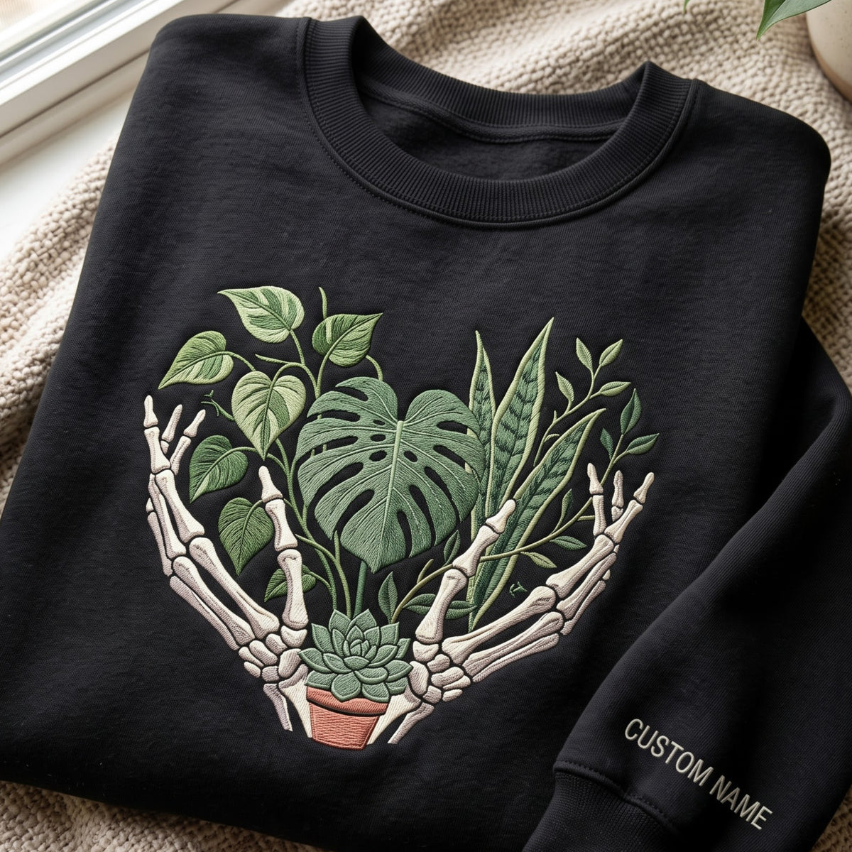 Personalized Skeleton Hands Holding Plants Monstera Succulent Plant Mom embroidered sweatshirt — front view