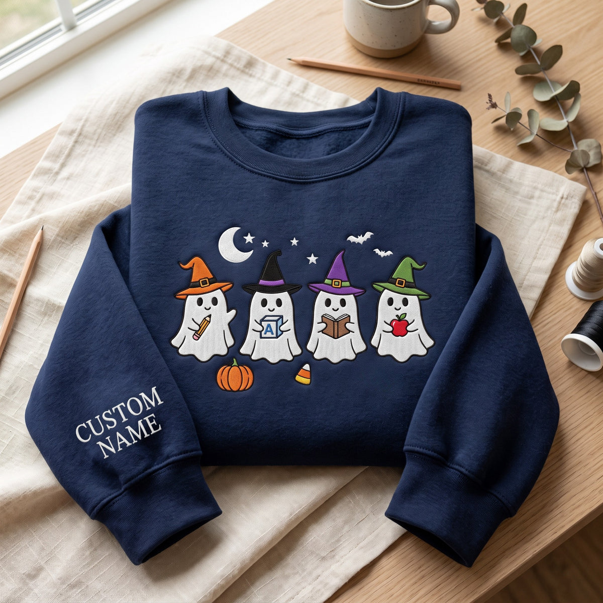 Personalized Halloween Four Ghost Teacher Witch Hat Pencil Apple Book embroidered sweatshirt — front view