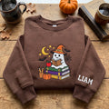 Personalized Halloween Reading Ghost Witch Hat Books Pumpkin Apple Teacher embroidered sweatshirt — front view