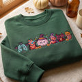 Halloween Anatomy Organs in Costumes Witch Devil Bat Pumpkin embroidered sweatshirt — front view