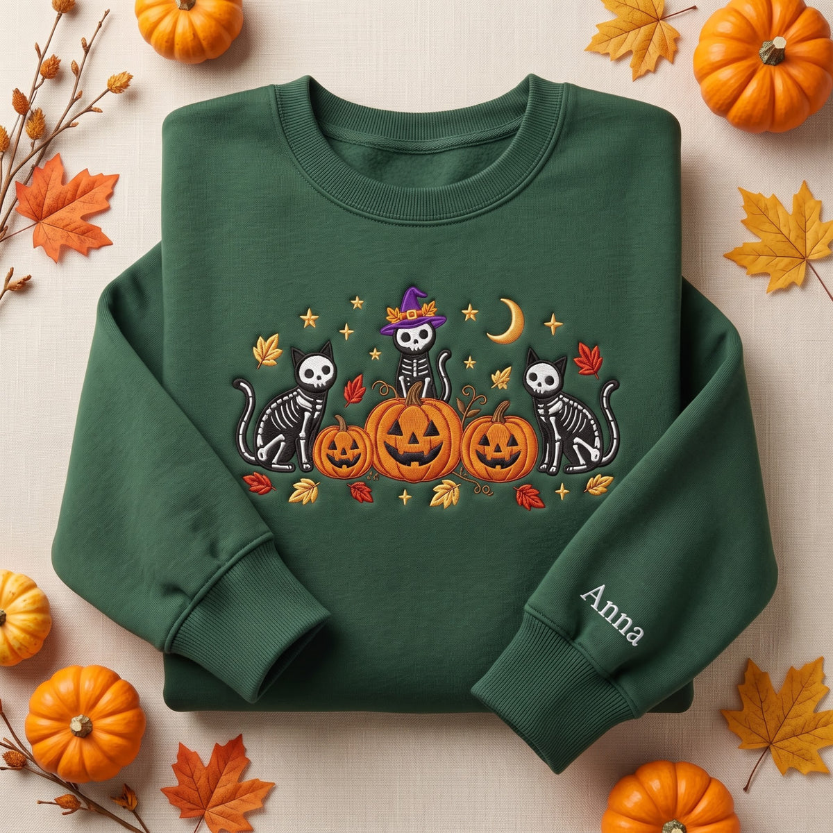 Personalized Halloween Three Skeleton Cats Witch Hat Pumpkins Fall Leaves Moon Stars embroidered sweatshirt — front view