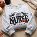 Personalized Halloween Nurse Pumpkin Bats Caduceus embroidered sweatshirt — front view