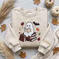 Personalized Halloween Ghost Reading Books Autumn Leaves Bat embroidered sweatshirt — front view