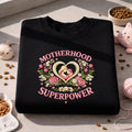 Motherhood Is My Superpower Floral Heart Mom Baby embroidered sweatshirt — front view