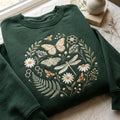 Wildflower Garden Butterfly Dragonfly Moth Bees Botanical Circle embroidered sweatshirt — front view
