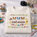 Personalized Cat Mom Floral Border Three Cats Yarn Ball embroidered sweatshirt — front view