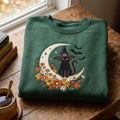 Halloween Black Cat Witch Hat Crescent Moon Floral Bats embroidered sweatshirt — front view