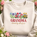 Grandma Loved by All of US Wildflower Bouquet embroidered sweatshirt — front view