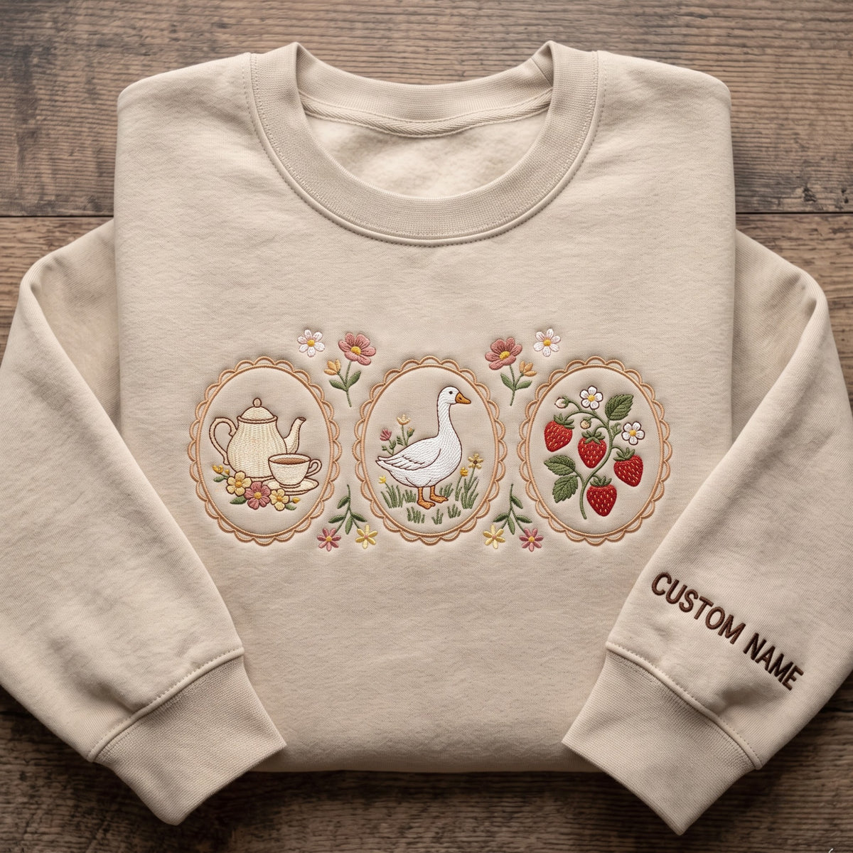 Personalized Cottagecore Goose Teapot Strawberry Floral Oval Frames embroidered sweatshirt — front view
