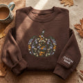 Personalized Floral Pumpkin Wildflower Botanical Fall Custom Name Sleeve embroidered sweatshirt — front view