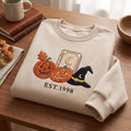 Personalized Halloween Jack-O-Lantern Witch Hat Spell Book EST Year embroidered sweatshirt — front view