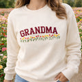 Personalized Grandma Wildflower Meadow Arch embroidered sweatshirt — front view