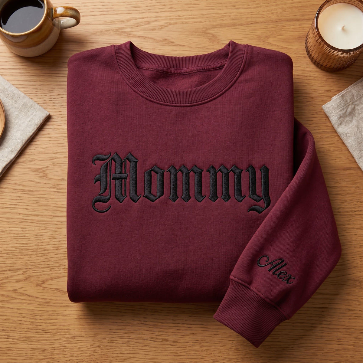 Personalized Mommy Old English Font Kids Names on Sleeve embroidered sweatshirt — front view