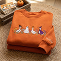 Personalized Halloween Costumed Geese Witch Ghost Pumpkin Wildflowers embroidered sweatshirt — front view
