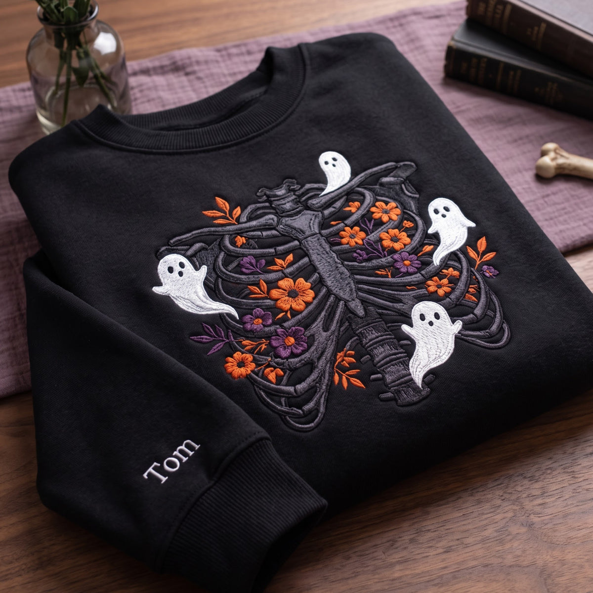 Personalized Halloween Floral Rib Cage Skeleton Ghosts embroidered sweatshirt — front view