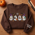 Personalized Halloween Teacher Ghost Witch Hat Apple Books Globe embroidered sweatshirt — front view