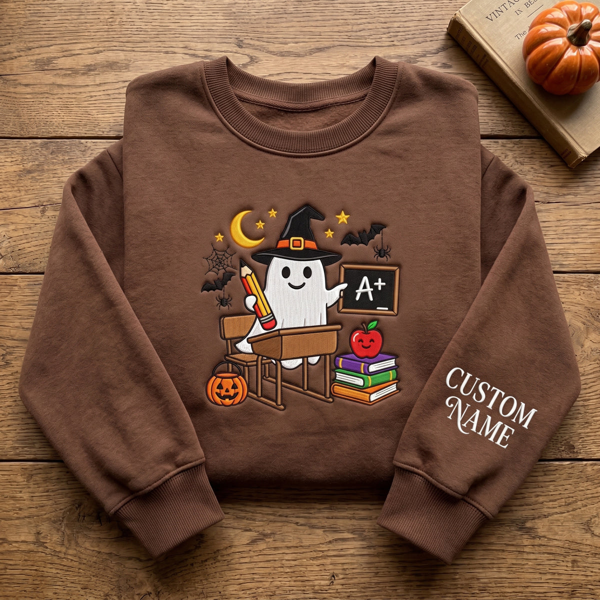 Personalized Halloween Ghost Teacher Witch Hat Desk Chalkboard Apple Books embroidered sweatshirt — front view