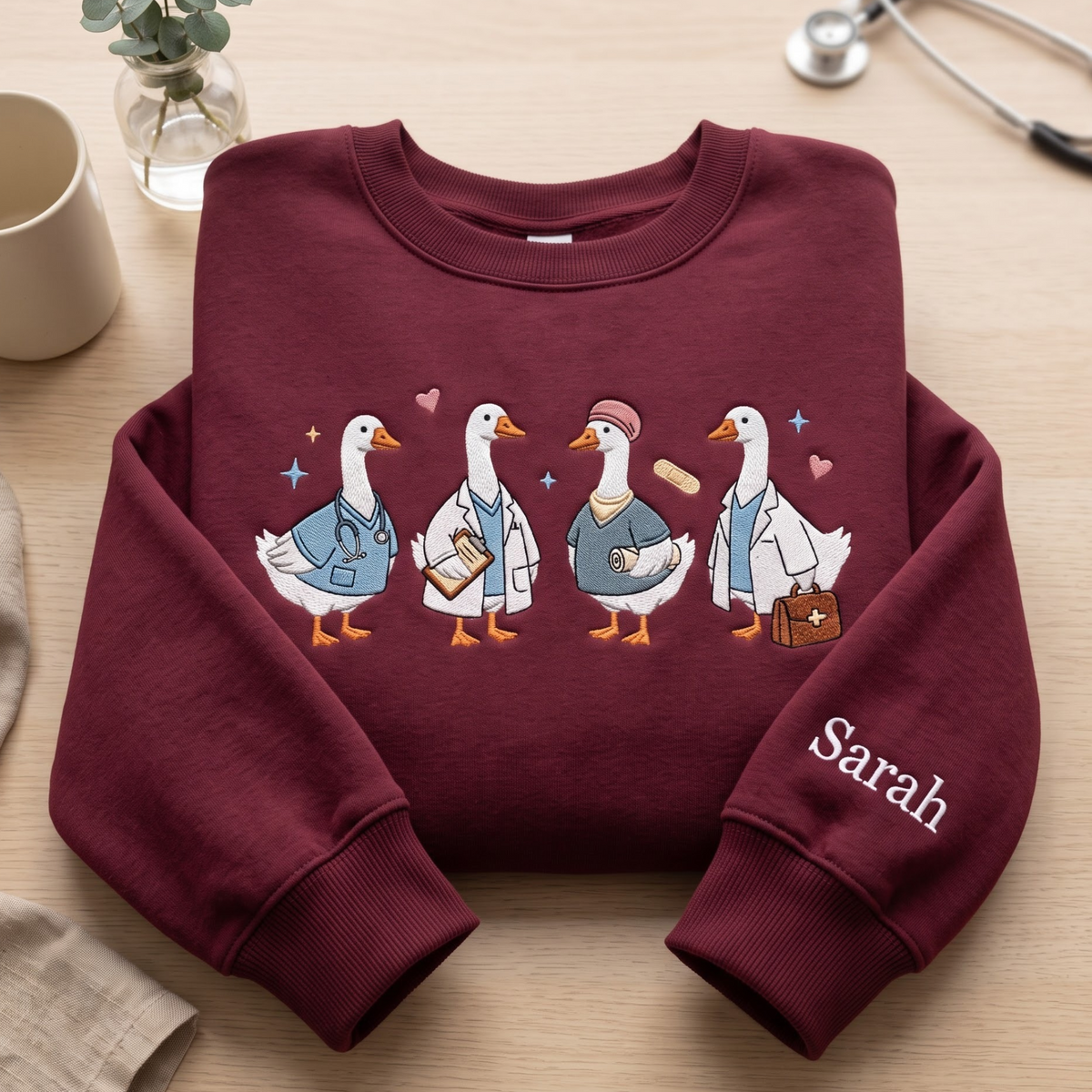 Personalized Nurse Geese Medical Team Cute Goose Healthcare embroidered sweatshirt — front view