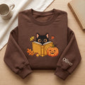Personalized Fall Black Cat Reading Book Pumpkin Halloween embroidered sweatshirt — front view
