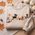 Halloween Dachshund Costumes Mummy Witch Pumpkin Prisoner Fall Leaves embroidered sweatshirt — front view