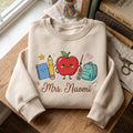 Personalized Teacher Apple Notebook Pencil Crayon Backpack Kawaii to School embroidered sweatshirt — front view