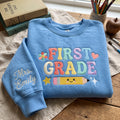 Personalized First Grade Teacher Pencil Pastel Rainbow embroidered sweatshirt — front view