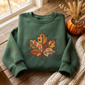 Fall Patchwork Maple Leaf Sunflower Pumpkin Pinecone Autumn Botanical embroidered sweatshirt — front view