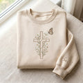 Personalized Floral Cross Wildflower Butterfly Faith embroidered sweatshirt — front view