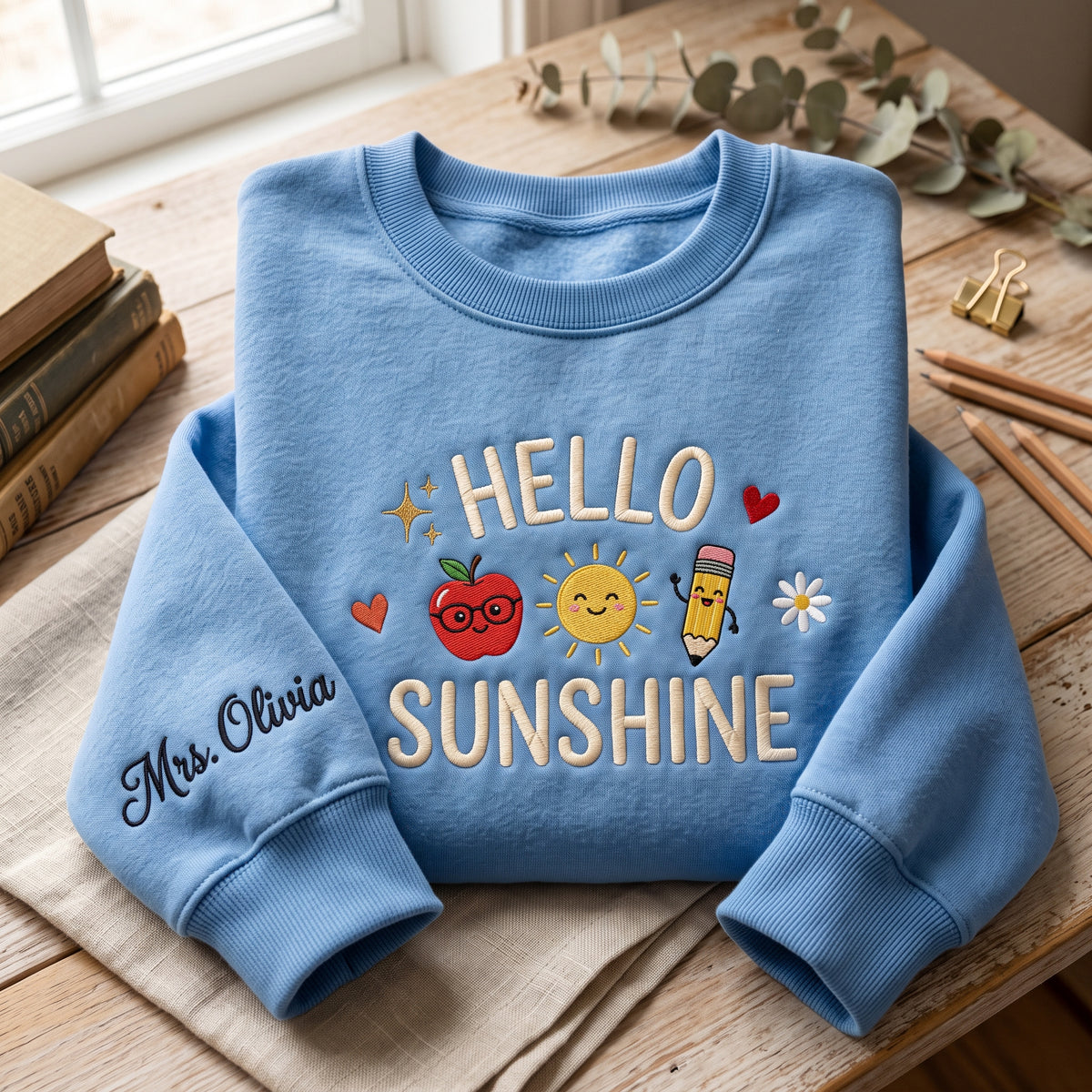 Personalized Hello Sunshine Teacher Apple Sun Pencil Daisy embroidered sweatshirt — front view