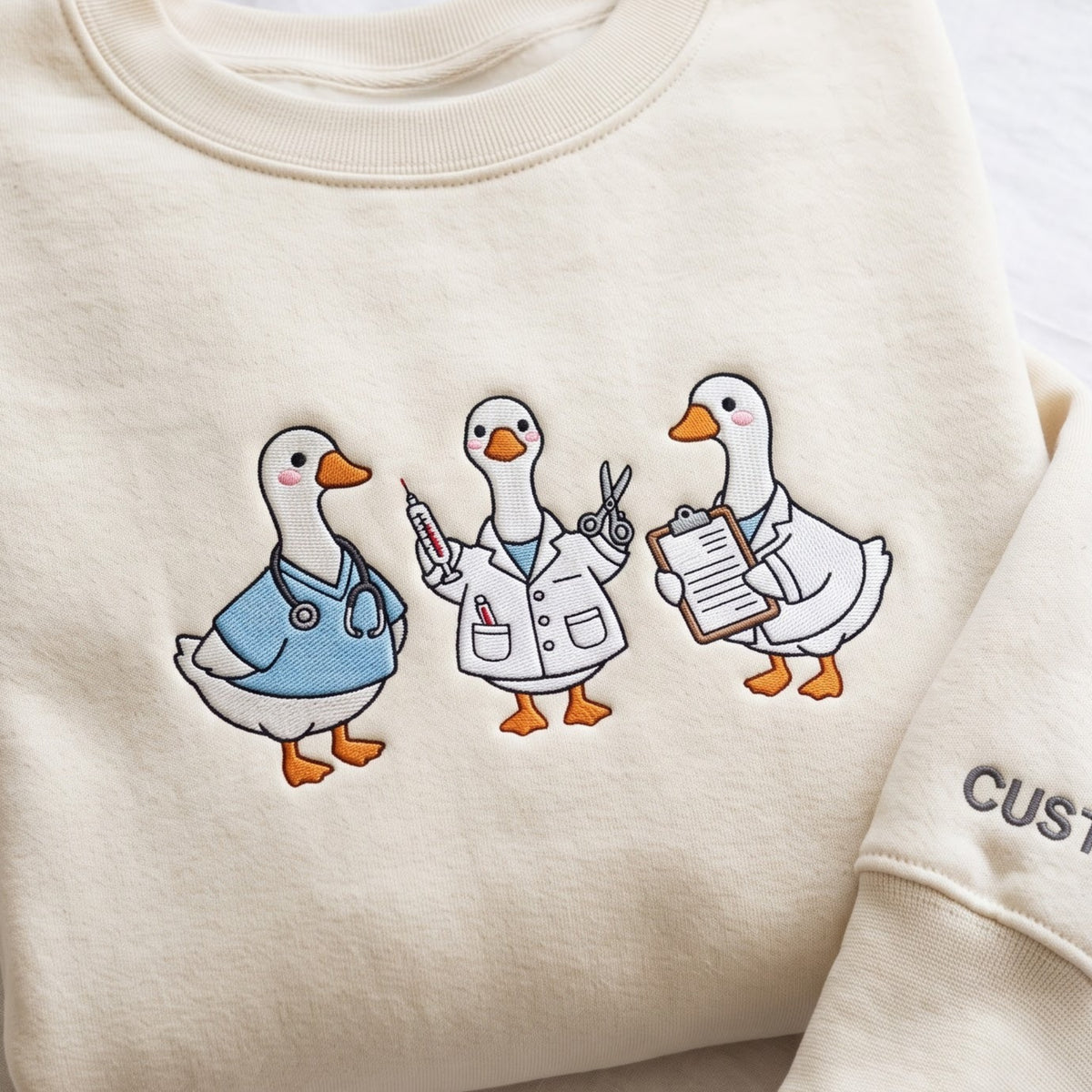 Personalized Doctor Nurse Goose Trio Medical Team embroidered sweatshirt — front view