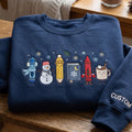 Personalized Winter Teacher Crayon Pencil Snowman Book Hot Cocoa Christmas embroidered sweatshirt — front view