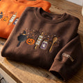 Personalized Halloween Baking Skillet Pumpkin Rolling Pin Ghost Jar Spoon embroidered sweatshirt — front view