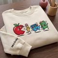 Personalized Teacher Apple Pac-Man Pencil Crayon Book Running embroidered sweatshirt — front view