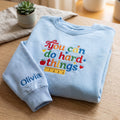 Personalized You Can Do Hard Things Teacher Colorful Ruler Apple embroidered sweatshirt — front view