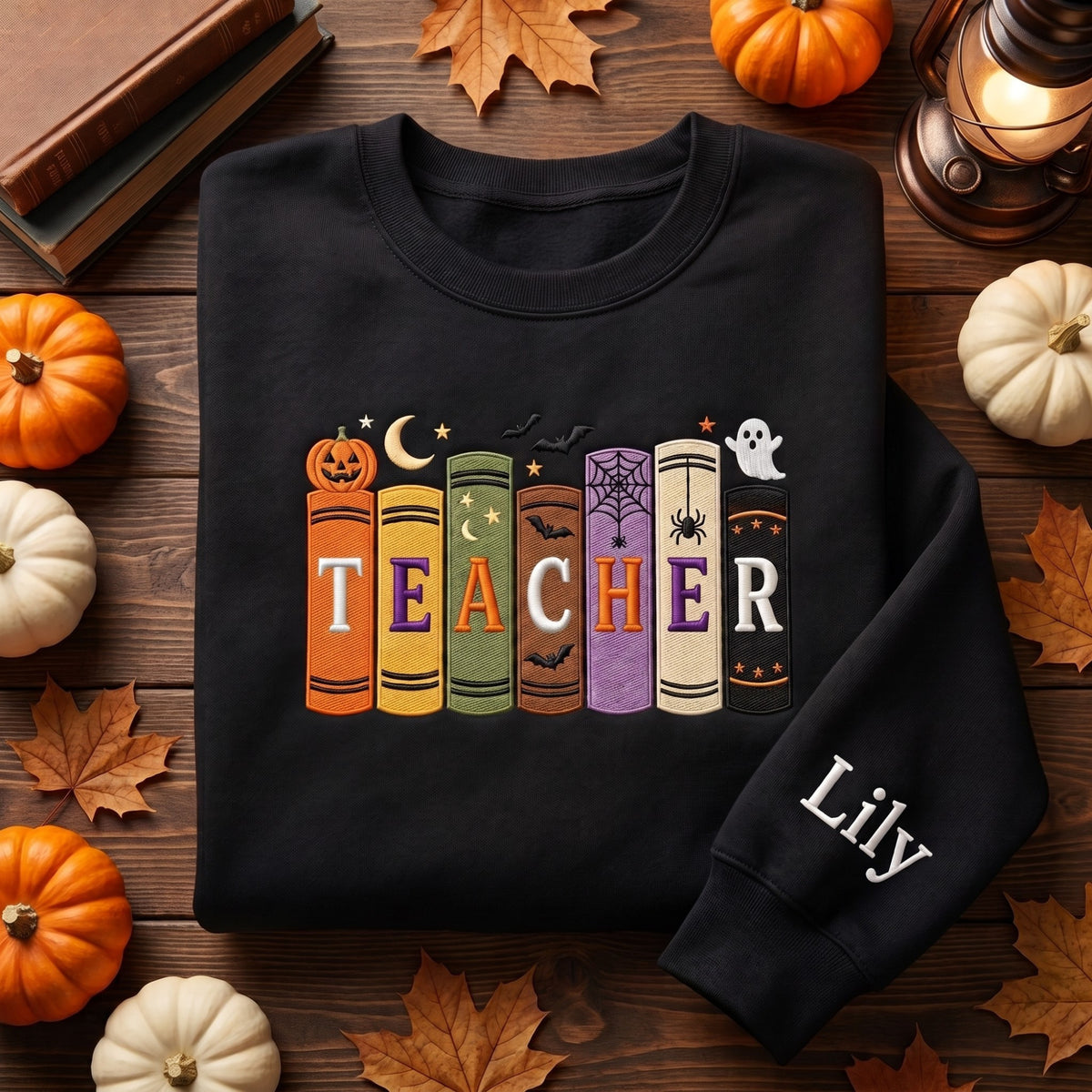 Personalized Halloween Teacher Books Pumpkin Ghost Spider Web embroidered sweatshirt — front view