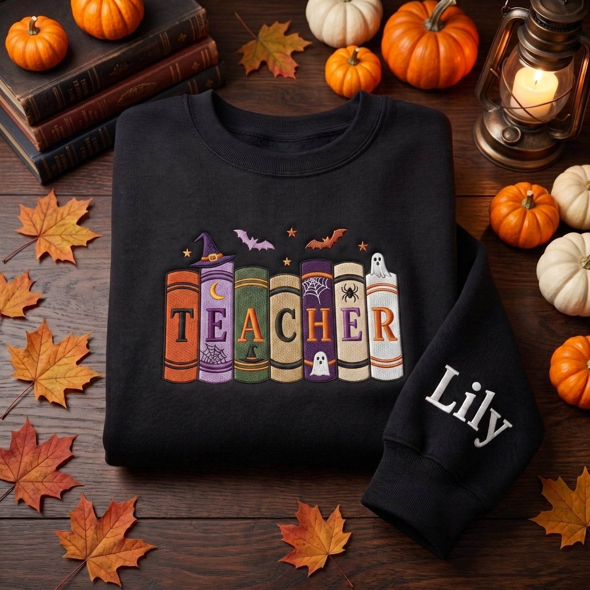 Personalized Halloween Teacher Spooky Books Witch Hat Ghost Bat Spider Web embroidered sweatshirt — front view