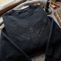 Death's Head Moth Skull Gothic Dark Academia embroidered sweatshirt — front view