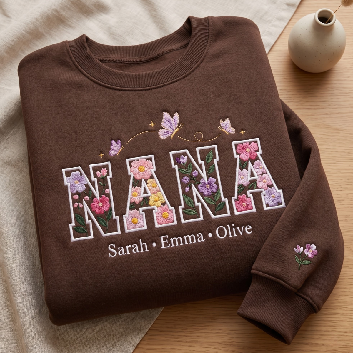 Personalized Nana Floral Letters Wildflower Butterflies Kids Names Sleeve embroidered sweatshirt — front view