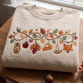 Autumn Infinity Vine Fox Lantern Pumpkin Pie Fall Leaves embroidered sweatshirt — front view