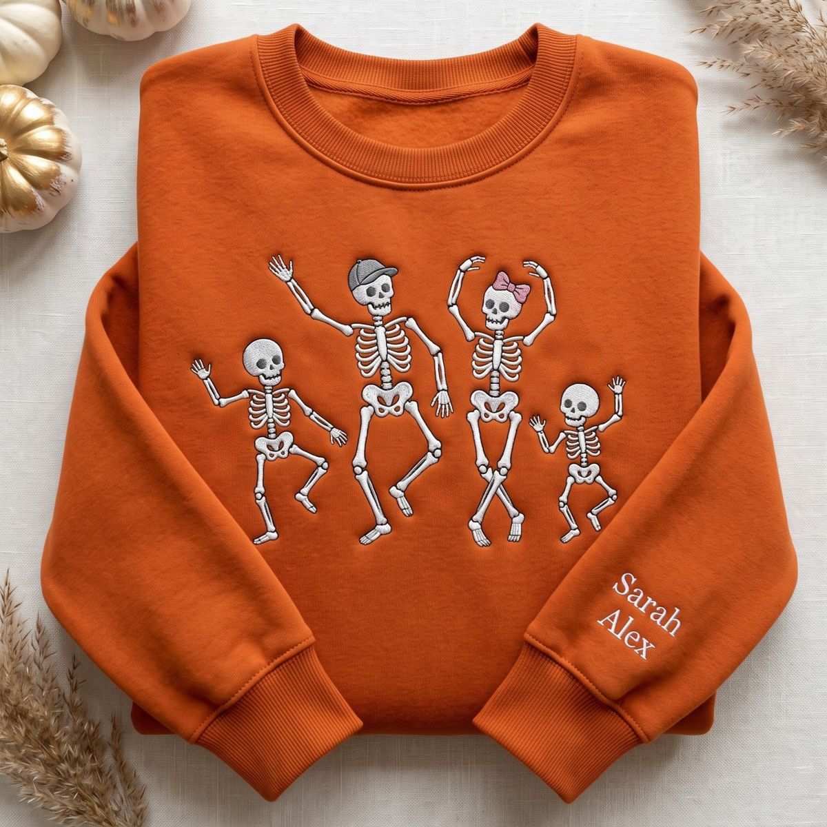 Personalized Halloween Dancing Skeleton Family Names on Sleeve embroidered sweatshirt — front view