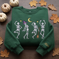 Personalized Halloween Dancing Skeletons Witch Hat Moon Stars Name on Sleeve embroidered sweatshirt — front view