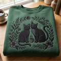 Two Black Cats Coffee Floral Wreath embroidered sweatshirt — front view