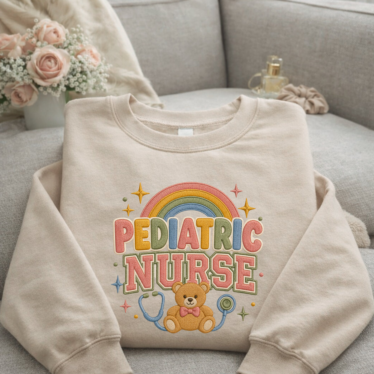 Pediatric Nurse Rainbow Teddy Bear Stethoscope Colorful embroidered sweatshirt — front view
