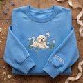 Personalized Goldendoodle Puppy Daisy Clover Butterfly Sleeve Name embroidered sweatshirt — front view