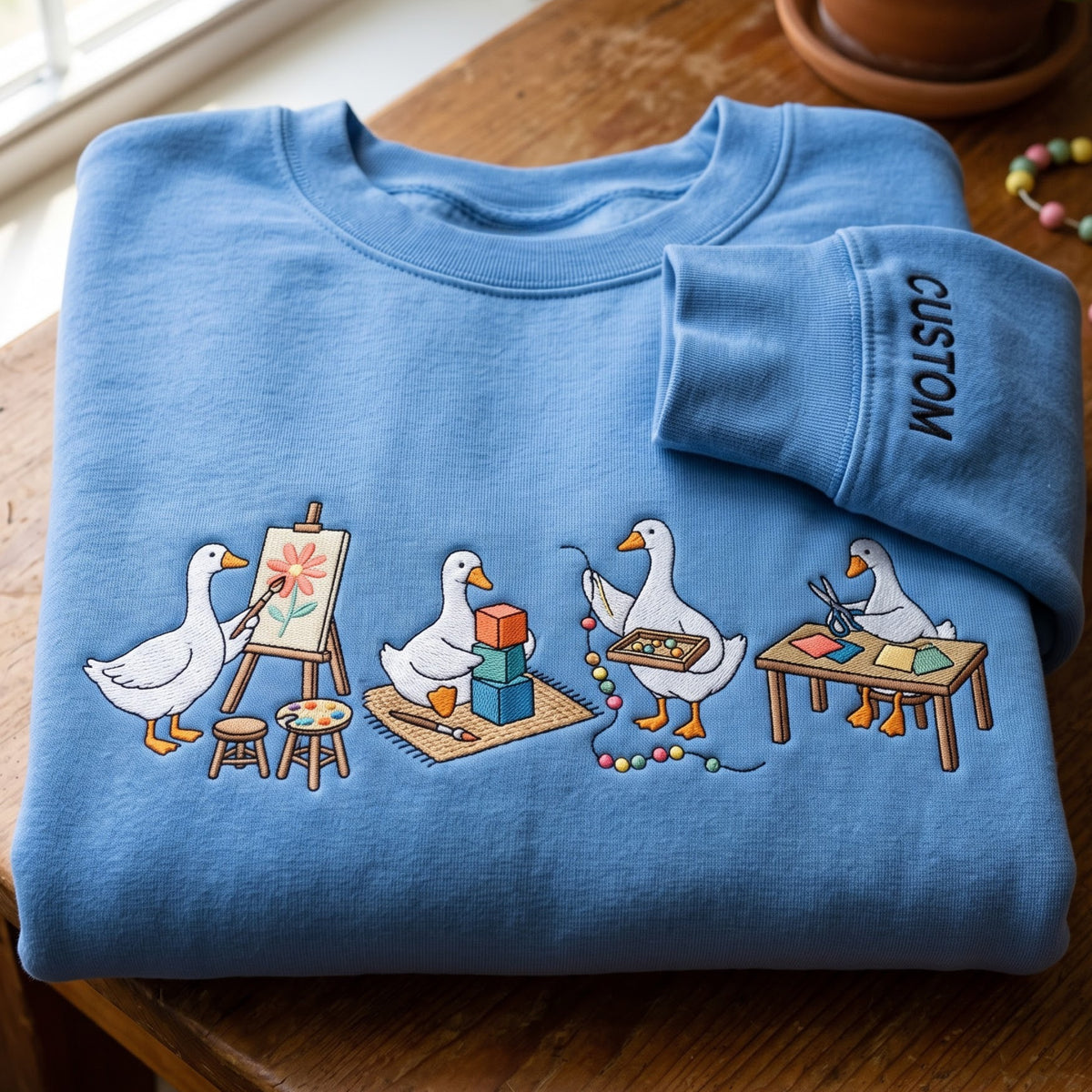Personalized Silly Goose Art Teacher Montessori Activities embroidered sweatshirt — front view